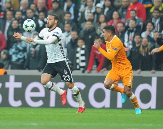 Cenk Tosun of Besiktas and Maxi Pereira (R) of Porto during the UEFA Champions League Group G match between Besiktas and Porto at Vodafone Park in Istanbul , Turkey on November 21, 2017. Final Scores: Besiktas 1 - Porto 1 