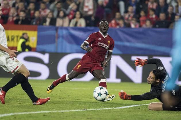 November 21, 2017 - Seville, Spain - SADIO MANE (C ) of Liverpool shoots and SERGIO RICO (R ) of Sevilla makes a save during the UEFA Champions League Group E soccer match between Sevilla FC and Liverpool FC at Estadio Ramon Sanchez Pizjuan Soccer 2017 - Sevilla FC vs Liverpool FC - ZUMAa142 20171121_zap_a142_006 Copyright: xDanielxGonzalezxAcunax