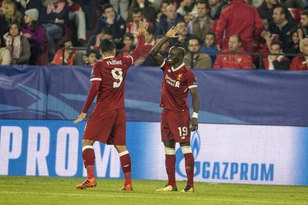 November 21, 2017 - Seville, Spain - SADIO MANE (R ) and ROBERTO FIRMINO of Liverpool celebrate after scoring 2-0 during the UEFA Champions League Group E soccer match between Sevilla FC and Liverpool FC at Estadio Ramon Sanchez Pizjuan Soccer 2017 - Sevilla FC vs Liverpool FC - ZUMAa142 20171121_zap_a142_007 Copyright: xDanielxGonzalezxAcunax
