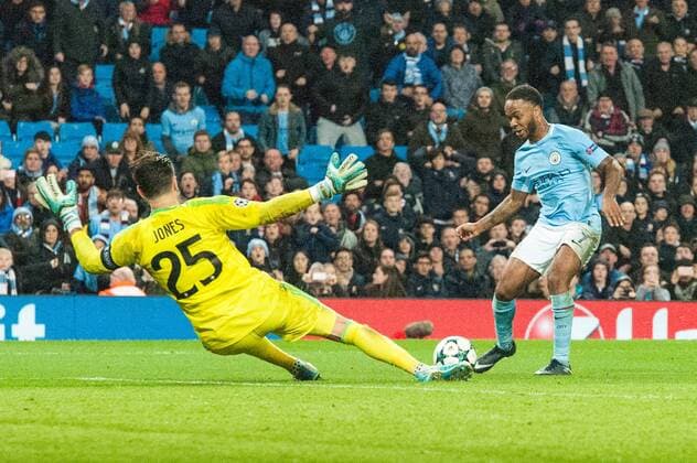 Manchester City v Feyenoord Rotterdam UEFA Champions League Raheem Sterling of Manchester City places the ball past Feyenoord Rotterdam goalkeeper Brad Jones to score his sides winning goal during the UEFA Champions League match at the Etihad Stadium, Manchester Content Not Available For UK Newspapers Copyright: xMattxWilkinsonx FIL-10984-0038