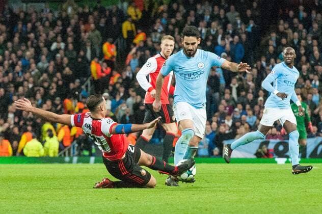 Manchester City v Feyenoord Rotterdam UEFA Champions League Sofyan Amrabat of Feyenoord Rotterdam tackles Ilkay Gundogan of Manchester City during the UEFA Champions League match at the Etihad Stadium, Manchester Content Not Available For UK Newspapers Copyright: xMattxWilkinsonx FIL-10984-0045