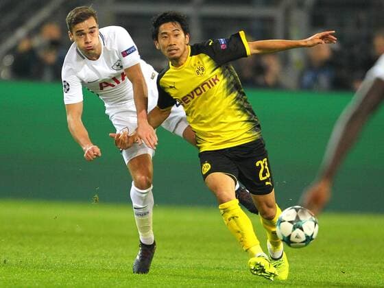 Borussia Dortmund v Tottenham Hotspur UEFA Champions League Shinji Kagawa of Borussia Dortmund and Harry Winks of Tottenham Hotspur during the UEFA Champions League match at Signal Iduna Park, Dortmund Content Not Available For UK Newspapers Copyright: xYannisxHalasx FIL-10982-0060