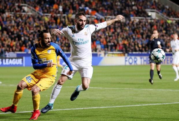 (171122) -- NICOSIA, Nov. 22, 2017 -- Real Madrid s Dani Carvajal (R) vies for the ball during the the UEFA Champions League Group H match against Apoel in Nicosia, Cyprus, Nov. 21, 2017. Real Madrid won 6-0. ) (SP)CYPRIS-NICOSIA-SOCCER-UEFA CHAMPIONS LEAGUE-REAL MADRID VS APOEL SakisxSavvides 