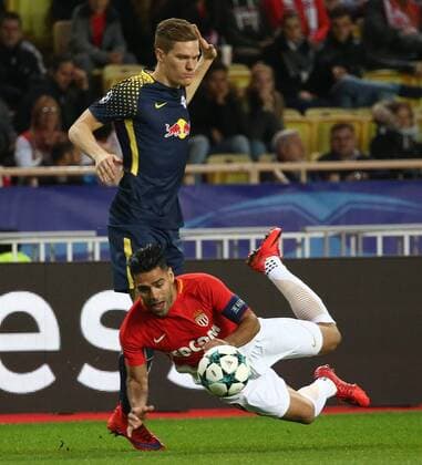 (171122) -- FONTVIEILLE, Nov. 22, 2017 -- Radamel Falcao (front) of Monaco competes with Marcel Halstenberg of Leipzig during their Group G match of UEFA Champions League in Fontvieille, Monaco on Nov. 21, 2017. Monaco was defeated 1-4.) (SP)MONACO-FONTVIEILLE-CHAMPIONS LEAGUE-MONACO VS LEIPZIG SergexHaouzi 