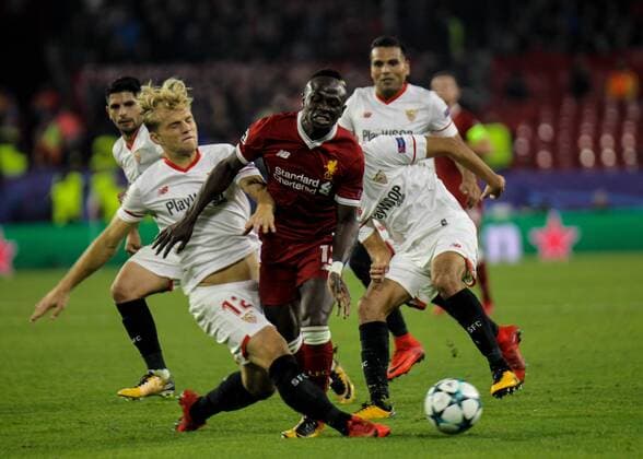 21st November 2017, Ramon Sanchez Pizjuan, Seville, Spain; UEFA Champions League, Seville versus Liverpool; Geis of Seville with a hard challenge on Sadio Man& xe9; of Liverpool  ActionPlus11954684
