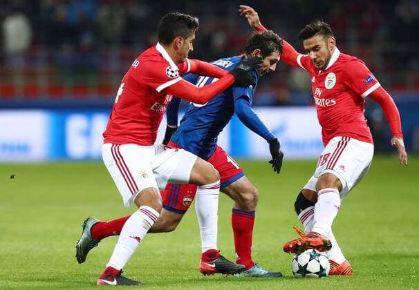 MOSCOW, RUSSIA â€“ NOVEMBER 22, 2017: CSKA Moscow s Alan Dzagoyev (C), Benfica Lisbonâ€™s Jardel (L) and Eduardo Salvio in their 2017 18 UEFA Champions League Group A Round 5 football match at VEB Arena; CSKA won 2-0. Stanislav Krasilnikov TASS  TS06A2CD