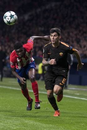 Atletico de Madrid Thomas Teye and Roma Diego Perotti during UEFA Champions League match between Atletico de Madrid and Roma at Wanda Metropolitano in Madrid, Spain. November 22, 2017.  (20171122014)