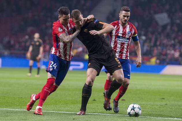 Atletico de Madrid Jose Maria Gimenez and Roma Edin Dzeko during UEFA Champions League match between Atletico de Madrid and Roma at Wanda Metropolitano in Madrid, Spain. November 22, 2017.  (20171122003)