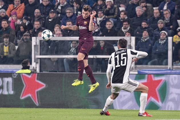 Lucas Digne of Barcelona and Andrea Barzagli of Juventus during the UEFA Champions League match between Juventus and Barcelona at the Juventus Stadium, Turin, Italy on 22 November 2017. Copyright: xGiuseppexMaffiax 17830015