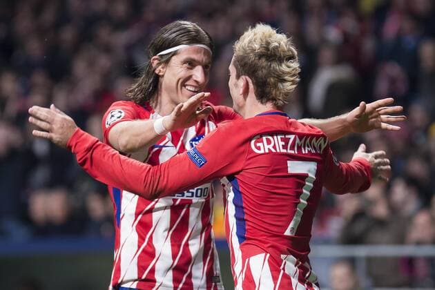 Atletico de Madrid Filipe Luis and Antoine Griezmann celebrating a goal during UEFA Champions League match between Atletico de Madrid and Roma at Wanda Metropolitano in Madrid, Spain. November 22, 2017.  (20171122029)