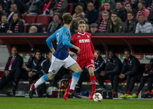 Koeln, Rhein Energie Stadion, 13.02.2016, Fußball, UEFA Europa League, FC Koeln - FC Arsenal Bild: vo.Calum Chambers (FC Arselnal, 21),hi.Jannes Horn (FC Köln, 23) Copyright: HMBxMedia ThomasxJäger