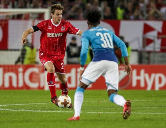 Koeln, Rhein Energie Stadion, 13.02.2016, Fußball, UEFA Europa League, FC Koeln - FC Arsenal Bild: vo.Ainsley Maitland-Liles (FC Arsenal, 30),hi.Lukas Klünter (FC Köln, 24) Copyright: HMBxMedia ThomasxJäger