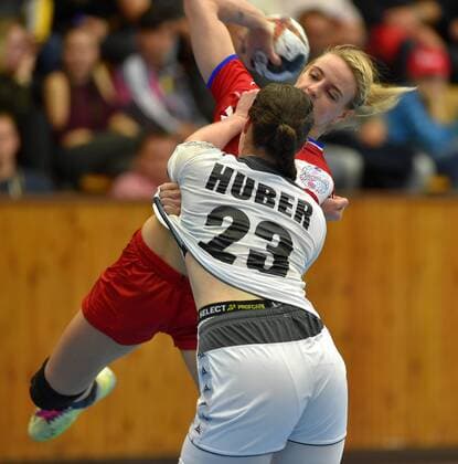 Josefine Huber of Austria, front, and Czech handball player Michaela Hrbkova in action during the friendly match Czech Republic vs. Austria, Cheb, Czech Republic, November 23, 2017. (CTKxPhoto SlavomirxKubes) CTKPhotoP201711230885901  KBS_07