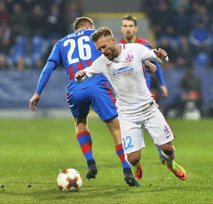 Daniel Kolar of Victoria, left, and Catalin Golofca of FCSB in action during the 5th round, Football European League match FC Viktoria Pilsen vs FC Steaua Bucurest (FCSB) in Pilsen, Czech Republic, November 23, 2017. (CTKxPhoto MiroslavxChaloupka) CTKPhotoP201711230889401  cha05
