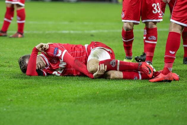 Koeln, Rhein Energie Stadion, 13.02.2016, Fußball, UEFA Europa League, FC Koeln - FC Arsenal Bild:Jannes Horn (FC Köln, 23) liegt verletzt auf dem Rasen Copyright: HMBxMedia ThomasxJäger