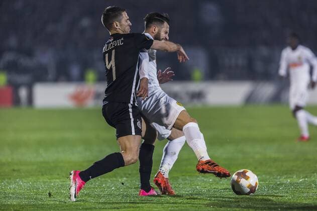 23rd November 2017, Partizan Stadium, Serbia, Belgrade; UEFA Europa League, Partizan versus Young Boys; Defender Miroslav Vulicevic of Partizan fights for the ball against Midfielder Miralem Sulejmani of Young Boys  ActionPlus11955158