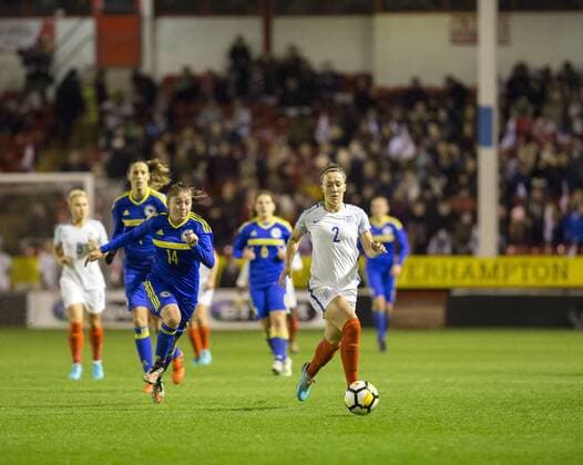 24th November 2017, Banks Stadium, Walsall, England; Women World Cup Qualification, England Women versus Bosnia and Herzegovina Women; Lucy Bronze of England chasing down the ball followed by Dajana Spasojevic of Bosnia and Herzegovina  ActionPlus11955436