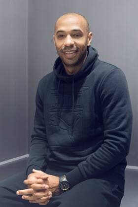 Legendary French football player Thierry Henry poses for photos during an exclusive interview in Shanghai, China, 24 November 2017. Thierry Henry flashes gracious smile at interview in Shanghai  pbu718215_02