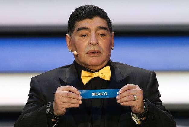 MOSCOW, RUSSIA - DECEMBER 1, 2017: Argentinian retired striker Diego Maradona holds a slip reading Mexico at the 2018 FIFA World Cup WM Weltmeisterschaft Fussball final draw at the State Kremlin Palace. Valery Sharifulin TASS  TS06B820