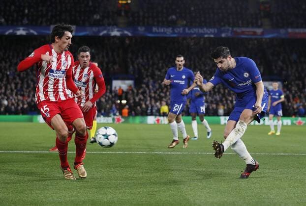 Cesc Fabregas of Chelsea shoots towards goal past Stefan Savic of Atletico Madrid during the Champions League Group C match at the Stamford Bridge, London. Picture date: December 5th 2017. Picture credit should read: David Klein Sportimage EDITORIAL USE ONLY. No use with unauthorised audio, video, data, fixture lists, club league logos or live services. Online in-match use limited to 120 images, no video emulation. No use in betting, games or single club league player publications.