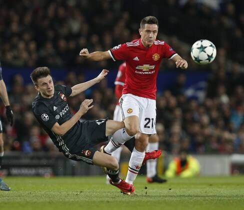 Ander Herrera of Manchester United ManU and Aleksandr Golovin of CSKA Moscow during the Champions League Group A match at the Old Trafford, Manchester. Picture date: December 5th 2017. Picture credit should read: Andrew Yates Sportimage EDITORIAL USE ONLY. No use with unauthorised audio, video, data, fixture lists, club league logos or live services. Online in-match use limited to 120 images, no video emulation. No use in betting, games or single club league player publications.