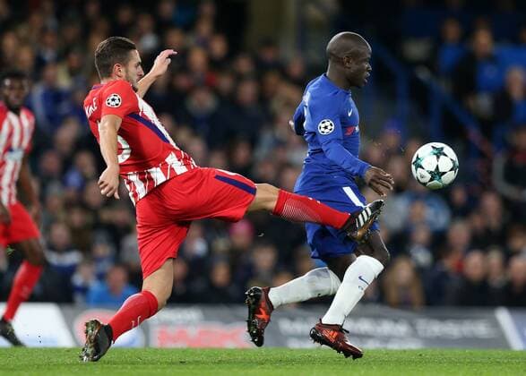 5th December 2017, Stamford Bridge, London, England; UEFA Champions League football, Chelsea versus Atletico Madrid; Koke of Atletico Madrid challenges Ngolo Kante of Chelsea  ActionPlus11959274