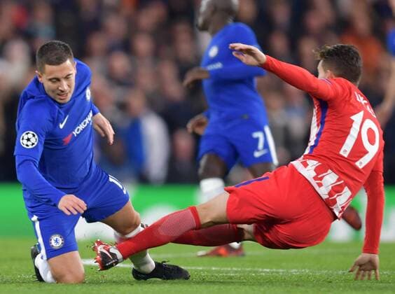 Chelsea v Atletico Madrid UEFA Champions League Eden Hazard of Chelsea is fouled by Fernando Torres of Atletico Madrid during the UEFA Champions League match at Stamford Bridge, London Content Not Available For UK Newspapers Copyright: xSimonxDaelx FIL-11053-0018