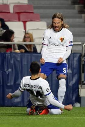 December 5, 2017 - Lisbon, Portugal - Basel s midfielder Mohamed Elyounoussi from Norway celebrates with Basel s defender Michael Lang from Suisse (R ) after scoring a goal during the UEFA Champions League Group A football match between SL Benfica and FC Basel at the Luz stadium in Lisbon, Portugal on December 5, 2017. SL Benfica v FC Basel - UEFA Champions League  - ZUMAn230 20171205_zaa_n230_367 Copyright: xPedroxFiuzax