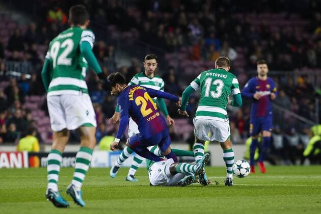 December 5, 2017 - Barcelona, Spain - UEFA Champions League football, Barcelona v Sporting Lisboa; Andre Gomes of FC Barcelona Barca receives a foul of Sporting Lisbon defense Soccer 2017: Barcelona 2:0 Sporting Lisbon  - ZUMA 20171205_mda_a178_088 Copyright: xEricxAlonsox