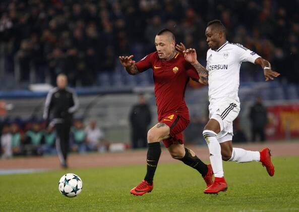 Italy: Soccer Champions League: Roma vs Qarabag Roma s Radja Nainggolan, left, is chased by Qarabag s Donald Guerrier during the Champions League Group C soccer match between Roma and Qarabag at the Olympic stadium. Roma won 1-0 to reach the round of 16. Rome Italy  RiccardoxDexLuca PacificxPress