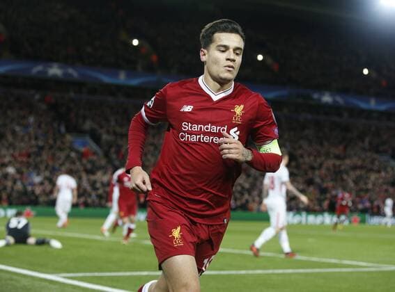 Philippe Coutinho of Liverpool celebrates scoring the second goal during the Champions League Group E match at the Anfield Stadium, Liverpool. Picture date: December 6th 2017. Picture credit should read: Andrew Yates Sportimage EDITORIAL USE ONLY. No use with unauthorised audio, video, data, fixture lists, club league logos or live services. Online in-match use limited to 120 images, no video emulation. No use in betting, games or single club league player publications.