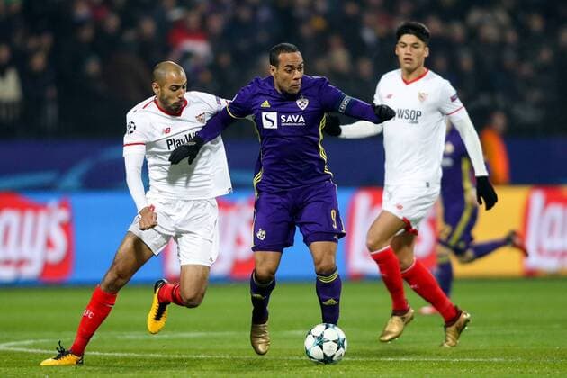 SOCCER - CL, Maribor vs Sevilla MARIBOR,SLOVENIA,05.DEC.17 - SOCCER - UEFA Champions League, group stage, NK Maribor vs FC Sevilla. Image shows Guido Pizarro (Sevilla) and Marcos Tavares (Maribor). GEPAxpictures xMaticxKlansek