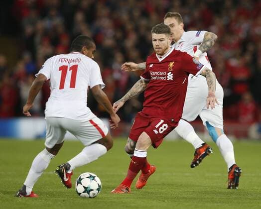 Fernando of Spartak Moscow tackled by Alberto Moreno of Liverpool during the Champions League Group E match at the Anfield Stadium, Liverpool. Picture date: December 6th 2017. Picture credit should read: Andrew Yates Sportimage EDITORIAL USE ONLY. No use with unauthorised audio, video, data, fixture lists, club league logos or live services. Online in-match use limited to 120 images, no video emulation. No use in betting, games or single club league player publications.