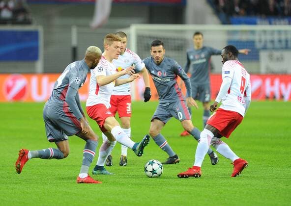 Diego Damme 31 , Naby Keita 8 of RB Leipzig and Anderson Talisca , Oguzhan Ozyakup 10 of Besiktas during the Champions league group G match between RB Leipzig and Besiktas in Red Bull Arena in Leipzig , Germany on December 06 , 2017. 