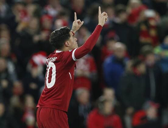Philippe Coutinho of Liverpool celebrates his hat trick goal during the Champions League Group E match at the Anfield Stadium, Liverpool. Picture date: December 6th 2017. Picture credit should read: Andrew Yates Sportimage EDITORIAL USE ONLY. No use with unauthorised audio, video, data, fixture lists, club league logos or live services. Online in-match use limited to 120 images, no video emulation. No use in betting, games or single club league player publications.
