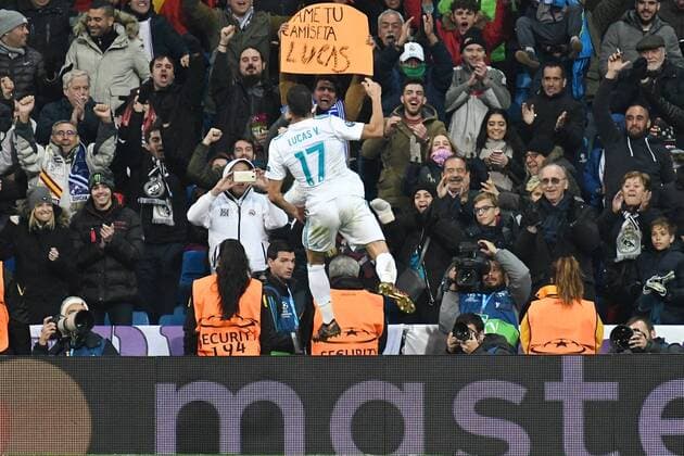 Real Madrid v Borussia Dortmund UEFA Champions League Lucas Vazquez of Real Madrid celebrates scoring their third goal to make it Real Madrid 3 Borussia Dortmund 2 as a fan holds up a banner asking for his shirt during the UEFA Champions League match at the Estadio Santiago Bernabeu, Madrid Content Not Available For UK Newspapers Copyright: xKristianxKanex FIL-11059-0037
