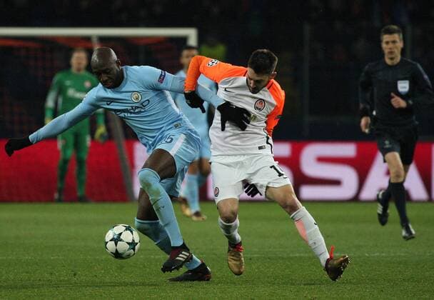 Defender Eliaquim Mangala (L) of Manchester City FC and forward Facundo Ferreyra of FC Shakhtar Donetsk are seen in action during the UEFA Champions League Group F match at the Metalist Stadium in Kharkiv, northeastern Ukraine, December 6, 2017. Ukrinform. KHARKIV. FC Shakhtar Donetsk has beaten Manchester City FC 2-1 in the UEFA Champions League Group F match at Kharkiv s Metalist Stadium. Pitmen?s midfielder Bernard and defender Ismaily put their team in the lead in the first half (26?, 32? respectively). The visitors managed to score in added time when Manchester City?s forward Sergio Aguero took a successful penalty kick. Thus, FC Shakhtar Donetsk secured the second place in Group F and put an end to a winning streak of Manchester City FC this season. To celebrate his team?s victory, coach Paulo Fonseca appeared at the post-match news conference dressed as Zorro. The Shakhtar manager fulfilled his promise he had made if the Ukrainian champions reached the knockout stage of the Champions League. Shakhtar defeats Manchester City in Kharkiv  Copyright: xDanilxShamkinx