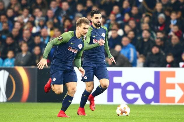 SOCCER - EL, Marseille vs RBS MARSEILLE,FRANCE,07.DEC.17 - SOCCER - UEFA Europa League, Olympique de Marseille vs Red Bull Salzburg. Image shows Fredrik Gulbrandsen and Munas Dabbur (RBS). GEPAxpictures xFelixxRoittner