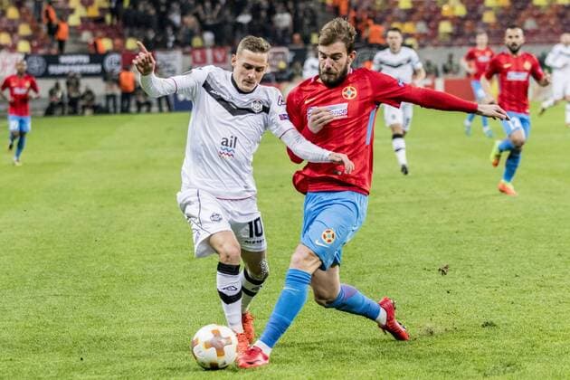 December 7, 2017: Mattia Bottani 10 (FC Lugano) and Mihai Balasa 4 (FCSB Bucharest) during the UEFA Europa League 2017-2018, Group Stage, Groupe G game between FCSB Bucharest (ROU) and FC Lugano (CHE) at National Arena Stadium, Bucharest, Romania ROU.  Copyright: xCronos CatalinxSoarex cronoscs7122017115006