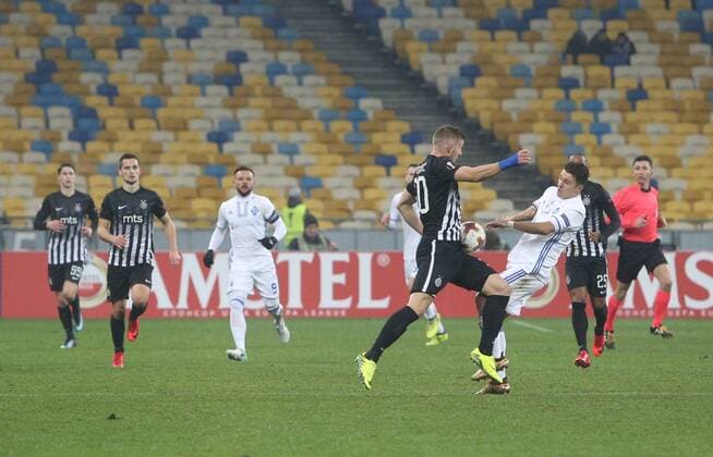 December 7, 2017 - Kiev, Ukraine - Dynamo s Junior Moraes (R) vies with Partizan s Milan Mitrovic (C) during the UEFA Europa League group stage football match between Dynamo Kyiv and FK Partizan in Kiev on December 7, 2017. Dinamo Kiev v Partizan - UEFA Europa League  - ZUMAn230 20171207_zaa_n230_599 Copyright: xSergiixKharchenkox
