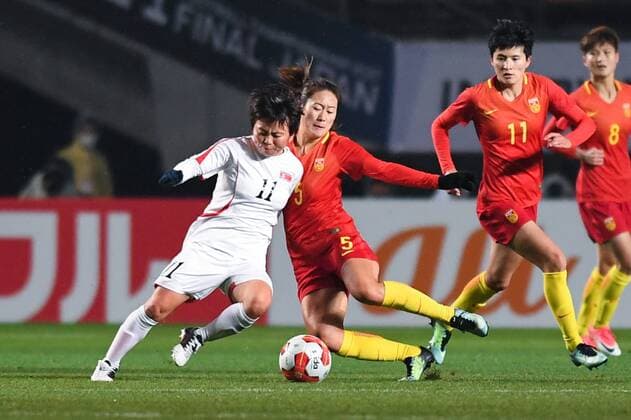 CHIBA, JAPAN - DECEMBER 08: Wu Haiyan 5 of China and Sung Hyang Sim 11 of North Korea compete for the ball during the EAFF E-1 Women s Football Championship between China and North Korea at Fukuda Denshi Arena on December 8, 2017 in Chiba, Japan.  Copyright: xVCGx CFP111140210845 
