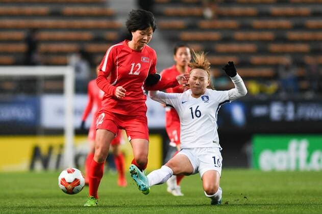 CHIBA, JAPAN - DECEMBER 11: Kim Yun Mi 12 of North Korea and Jang Selgi 16 of South Korea compete for the ball during the EAFF E-1 Women s Football Championship between North Korea and South Korea at Fukuda Denshi Arena on December 11, 2017 in Chiba, Japan.  Copyright: xVCGx CFP111140541167 