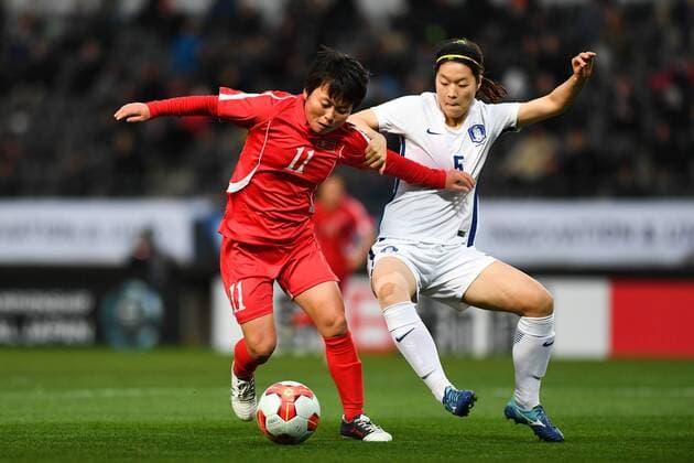 CHIBA, JAPAN - DECEMBER 11: Sung Hyang Sim 11 of North Korea and Kim Doyeon 5 of South Korea compete for the ball during the EAFF E-1 Women s Football Championship between North Korea and South Korea at Fukuda Denshi Arena on December 11, 2017 in Chiba, Japan.  Copyright: xVCGx CFP111140541171 
