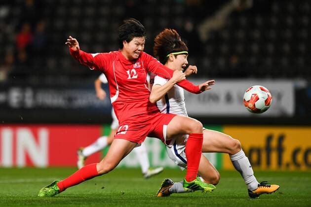 CHIBA, JAPAN - DECEMBER 11: Kim Yun Mi 12 of North Korea and Lim Seonjoo 6 of South Korea compete for the ball during the EAFF E-1 Women s Football Championship between North Korea and South Korea at Fukuda Denshi Arena on December 11, 2017 in Chiba, Japan.  Copyright: xVCGx CFP111140546559 