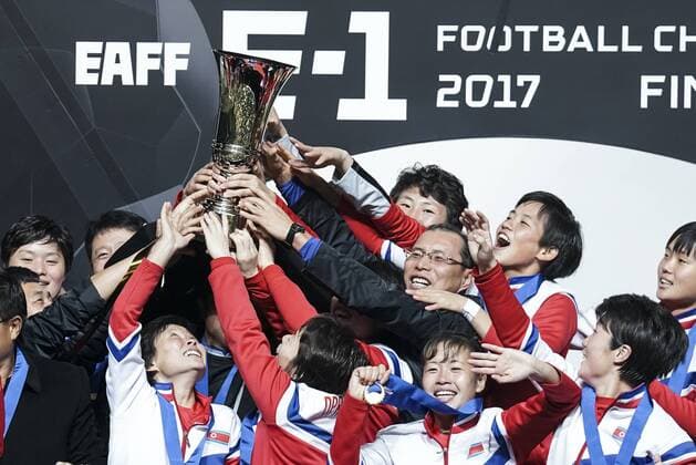 CHIBA, JAPAN - DECEMBER 15: North Korean players pose with the trophy as they cerebrate the East Asian Champions at the award ceremony following their 2-0 victory the EAFF E-1 Women s Football Championship between Japan and North Korea at Fukuda Denshi Arena on December 15, 2017 in Chiba, Japan.  Copyright: xVCGx CFP111140898372 