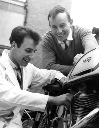 Mono Print M00 United Kingdom England Another racer in a famous family . Norman Surtees , 21 , younger brother of World Champion motorcyclist John Surtees , is taking up road racing as a follow-on to his motorcycle scrambling . He is seen working on one of his machines with brother John laughingly giving him some brotherly advice . 12 July 1960  UnitedArchives81310033