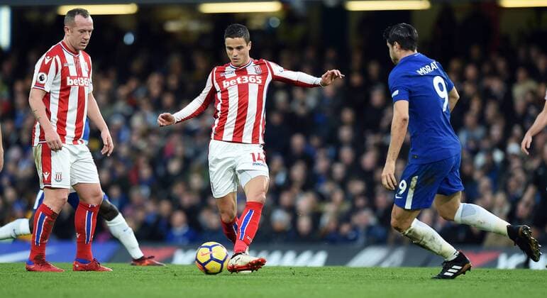 Ibrahim Afellay of Stoke City is challenged by Alvaro Morata of Chelsea during the premier league match at Stamford Bridge Stadium, London. Picture date 30th December 2017. Picture credit should read: Robin Parker Sportimage EDITORIAL USE ONLY. No use with unauthorised audio, video, data, fixture lists, club league logos or live services. Online in-match use limited to 120 images, no video emulation. No use in betting, games or single club league player publications. HIP_1042.JPG