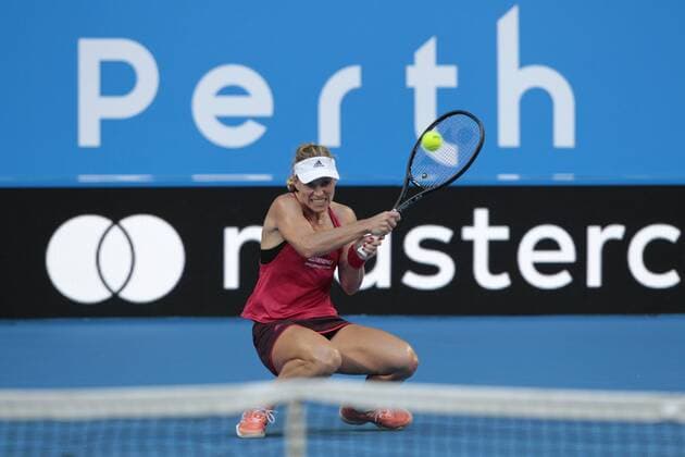 1st January 2018, Perth Arena, Perth, Australia; MasterCard Hopman Cup Tennis; Angelique Kerber of Team Germany plays a low forehand shot against Elise Mertens of Team Belgium Kerber won 2 sets to 0  ActionPlus11967109