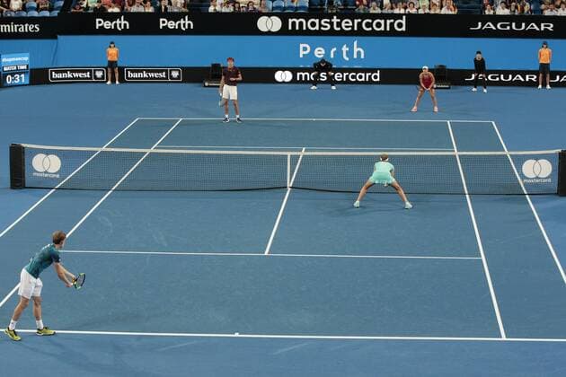 1st January 2018, Perth Arena, Perth, Australia; MasterCard Hopman Cup Tennis; David Goffin of Team Belgium prepares to serve to Angelique Kerber of Team Germany during the mixed doubles won by Germany 2 sets to love  ActionPlus11967219