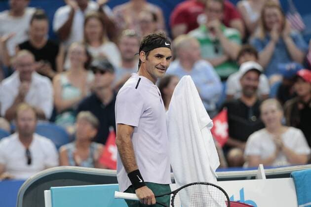 4th January 2018, Perth Arena, Perth, Australia; MasterCard Hopman Cup Tennis; Roger Federer of Team Switzerland looks over at Jack Sock of Team USA after Federer made a series of incredible shots during their match  ActionPlus11967989
